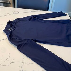 Under Armour® Boy’s ColdGear Mock Neck Long Sleeve Shirt. Logo stitched on neck.
